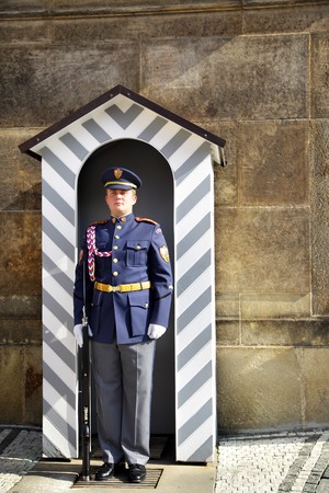 PRAGUE - OCTOBER 3: Guard at Prague Castle, October 3, 2009 in Prague, Czech Republic. At 12 noon,...