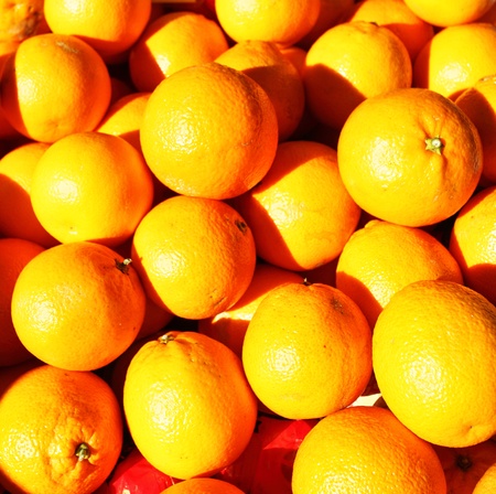 Oranges close up at a market stall 