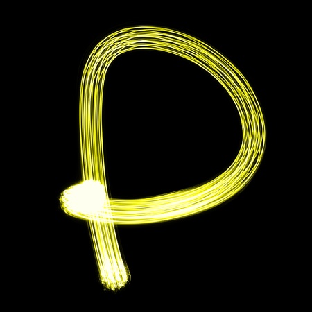 P - Created by light alphabet over black backgroundの写真素材