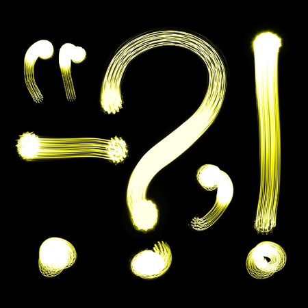 MARKS - Created by light alphabet over black backgroundの写真素材