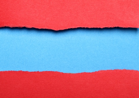 Torn color paper background with space for your textの写真素材