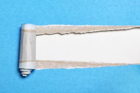 Blue paper background with space for your own textの写真素材