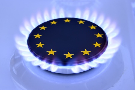 Gas flame and European Union Sign on the hobの写真素材