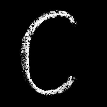 C - Chalk alphabet over black backgroundの写真素材