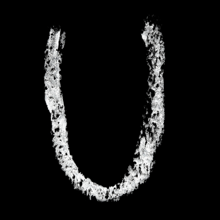 U - Chalk alphabet over black backgroundの写真素材
