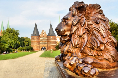 Lion beside Holstein Gate (built in 1478), Lubeck, Germanyの写真素材