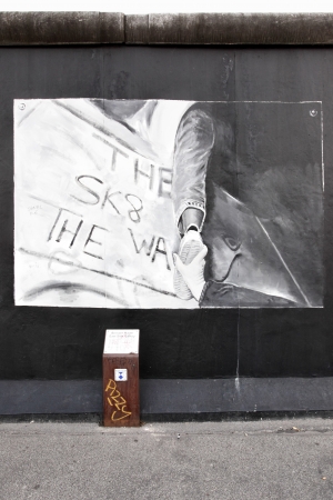 BERLIN - AUGUST 22: Famous painting on a preserved segment of the Berlin wall (1961-1989) at East Side Gallery August 22, 2012 in Berlin のeditorial素材