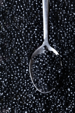 Black caviar and spoon close-upの写真素材