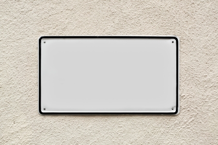 Blank sign on the wallの写真素材