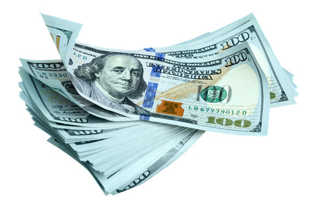 Heap of new dollar bills isolated over the white の写真素材