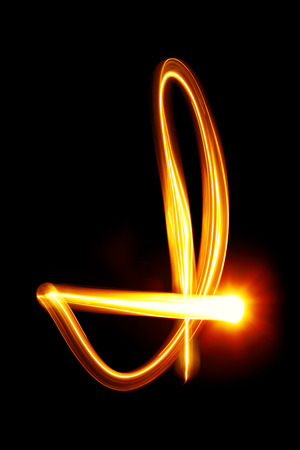 I - Created by light alphabet over black backgroundの写真素材