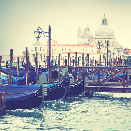 Gondolas in Venice, Italy. Toned imageの写真素材