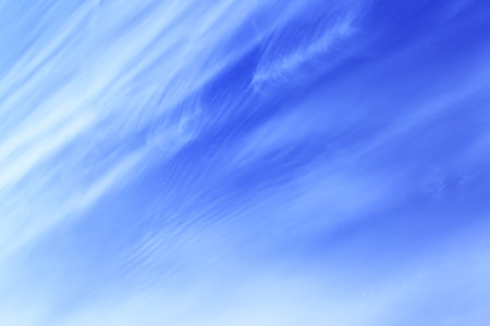 Blue spring sky with cirrus clouds - abstract background