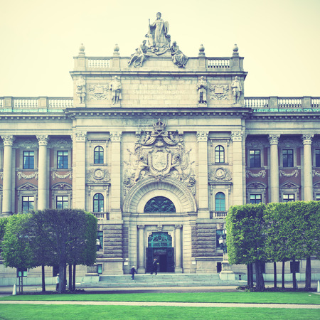 Front of Parliament building Riksdag in Stockholm, Sweden. Retro style filtred imageのeditorial素材