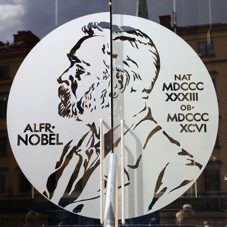 STOCKHOLM, SWEDEN - May 21, 2015: Portrait of Alfred Nobel on the glass door of Swedish Academy and Nobel Museum in Stockholmのeditorial素材