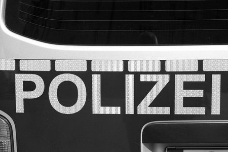 Back of german police car. Black and white image