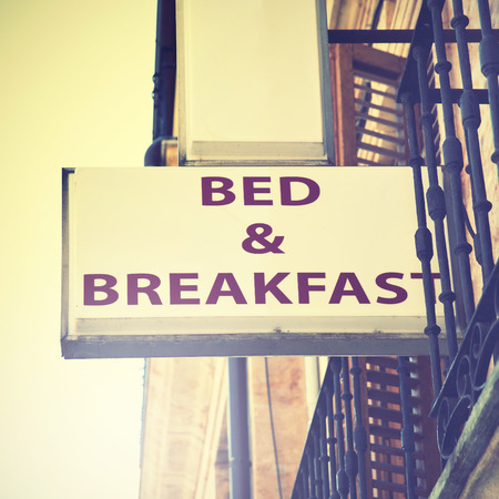 Bed and breakfast hotel sign. Retro style filtred imageの写真素材