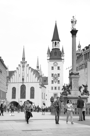 MUNICH, GERMANY - May 18, 2016: People on Marienplatz in Munich. Black and white imageのeditorial素材