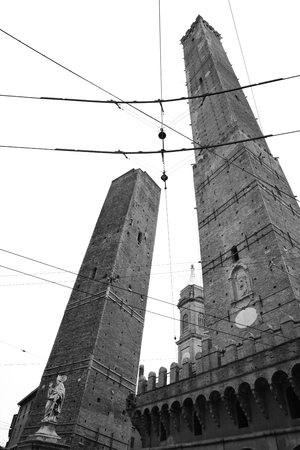 Asinelli and Garisenda towers in Bologna, Italy. Black and white image