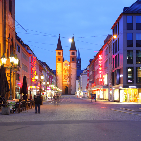 Wurzburg, Germany - April 21, 2013: Shopping street in front of the Wurzburger Dom church in the Old Town of Wurzburgのeditorial素材