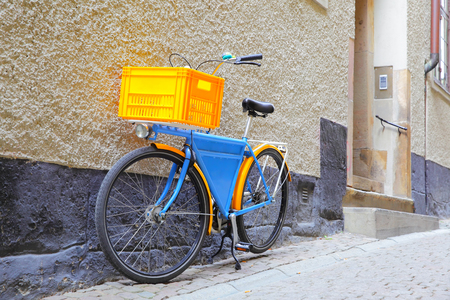 Bicycle painted in Swedish flag colors in Stockholm, Swedenの写真素材