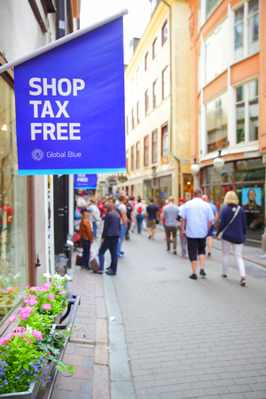 Stockholm, Sweden - July 25, 2017: Shop Tax Free sign on main shopping street of Gamla Stan in Stockholmのeditorial素材