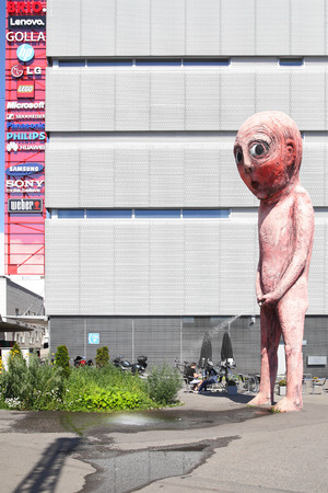 Helsinki, Finland - July 26, 2017: Peeing Bad Bad Boy sculpture by Tommi Toija near shopping mall in Helsinkiのeditorial素材
