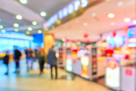 Duty free shop in airport out of focus  - defocused background            の写真素材