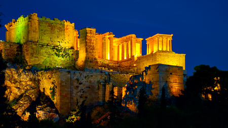 The Acropolis in Athens with lighting at night, Greeceの写真素材