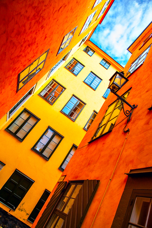 Colorful yellow houses in old town of Stockholm, Swedenの写真素材