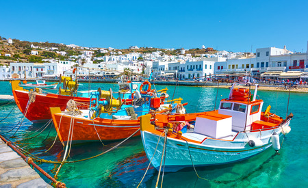 Port with old fishing boats and the waterfront in Mykonos Islang, Greeceの写真素材