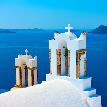Belfry of greek orthodox church in Oia in Santorini, Greece - Landscapeの写真素材