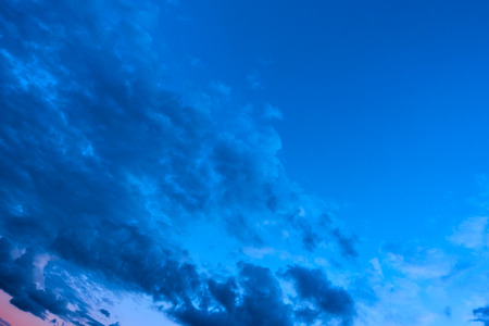 Dark sky with clouds afrer sundown, may be used as background. Copyspace compositionの写真素材