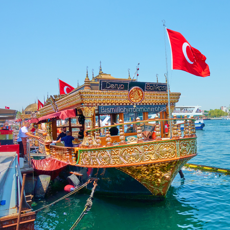 Istanbul, Turkey - July 17, 2018: Floating cafes with turkish street food (Balik Ekmek) in Istanbulのeditorial素材