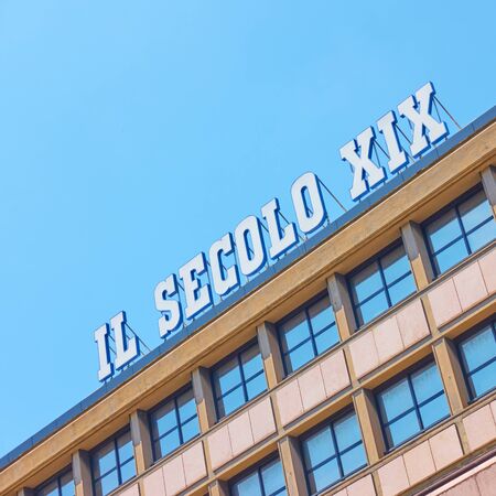 Genoa , Italy - July 4, 2019:  Sign on the roof of the editorial office of Il Secolo XIX  -  an...