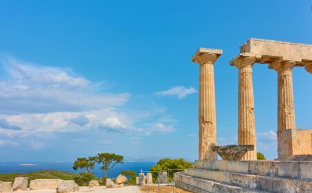 Columns of The Temple of Aphaea in Aegina Island and sea,  Greece - Greek landscape, space for your own textの写真素材
