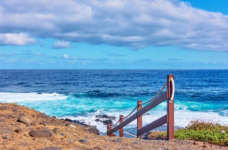 The Atlantic Ocean and rocky coast of Tenerife island with footpath to the water, The Canaries - Landscape, seascapeの写真素材
