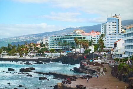 Puerto de la Cruz, Tenerife,  Spain - December 13, 2019: Waterfront and resort hotels on the coast in Puerto de la Cruz, The Canary Islandsのeditorial素材