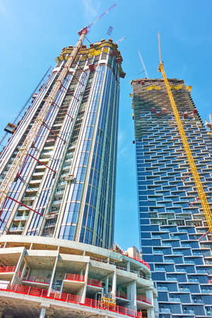Dubai, UAE - February 01, 2020: New hi-rise buildings under construction in Downtown Dubai, United...