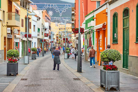 Candelaria, Tenerife, Spain - December 12, 2019: Street in Candelaria town with walking peopleのeditorial素材