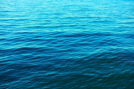 Rippled sea water surface -  Natural blue background