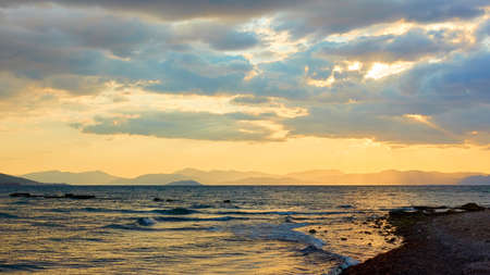 Seascape with the sea and islands at sundown. Aegina island, Greece. Greek lanscapeの写真素材