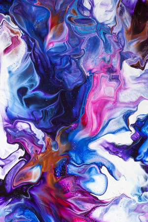 Fantastical colorful pattern of liquid paint. Fluid art abstract backgroundの写真素材