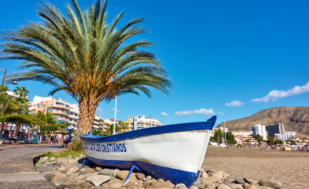 Los Cristianos, Tenerife, Spain - December 12, 2019: Waterfront and sandy beach in Los Cristianos, Tenerife Island, The Canariesのeditorial素材