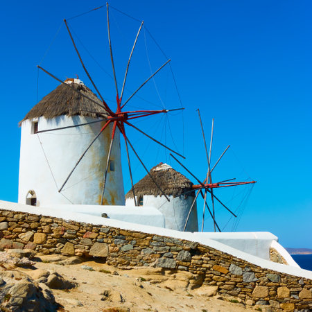 Windmills by the sea. Landmark of Mykonos island in Greece. Greek rural landscapeの写真素材