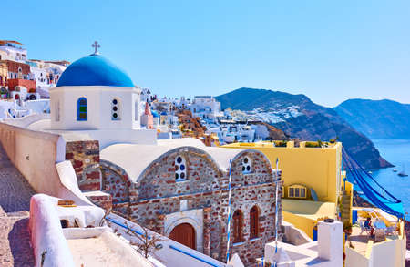 Landscape with ancient greek church on picturesque coast of Santorini island, Oia, Greece. Greek architectureの写真素材