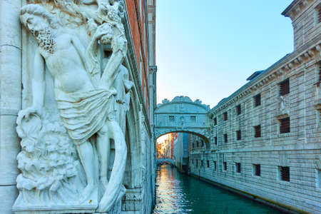 Drunkenness of Noah sculpture and The Bridge of Sighs in Venice, Italyの写真素材