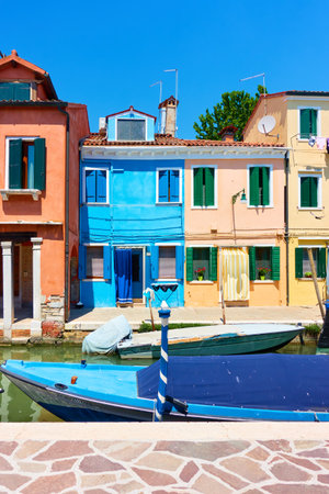 Colorful houses by canal in Burano in Venice, Italy. Venetian cityscapeの写真素材