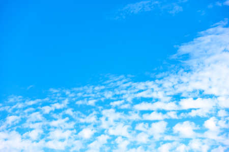Sky with small white clouds. Background with copy spaceの写真素材