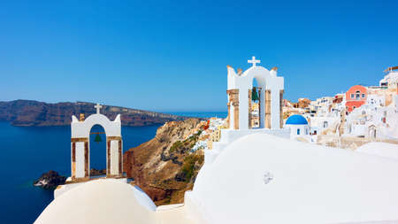 Greece, Santorini Island. Scenic view of Oia city by the sea. Greek landscapeの写真素材